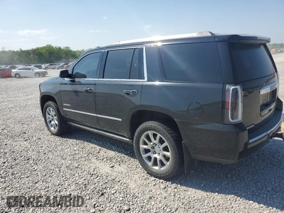 2015 GMC Yukon Denali z VIN 1GKS2CKJ8FR132636, wystawiony jako Copart lot #53567045 z przebiegiem 148 997 mil mil oraz Szkoda całkowita • Salvage title. Historia ofert i sprzedaży dostępna na DreamBid. Obrazek 2.