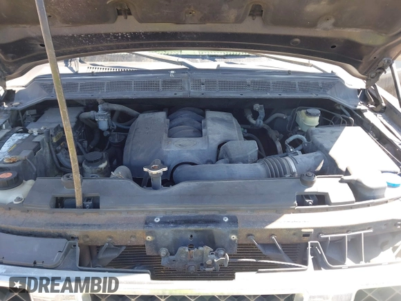 2005 Nissan Titan XE with VIN 1N6BA06A15N560400, listed as a IAAI auction lot 41656560 with 212,568 mi miles. Bid and sale history available at carsss.com. Image 10.