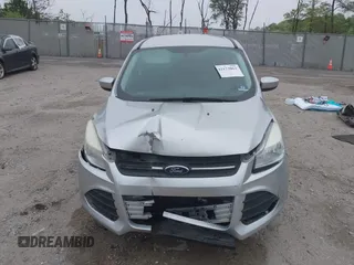2015 Ford Escape SE z VIN 1FMCU0G73FUB10414, wystawiony jako IAAI lot #42173063 z przebiegiem 120 200 mil mil oraz . Historia ofert i sprzedaży dostępna na DreamBid. Obrazek 13.