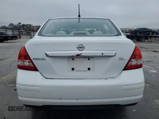 2009 Nissan Versa S z VIN 3N1BC11E09L352045, wystawiony jako Copart lot #46843955 z przebiegiem 170 741 mil mil oraz Szkoda całkowita • Salvage title. Historia ofert i sprzedaży dostępna na DreamBid. Obrazek 6.