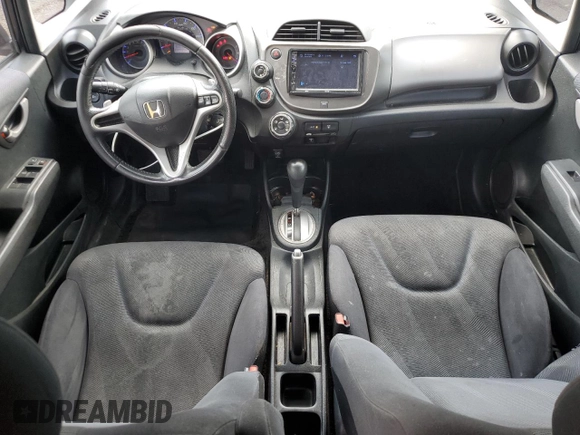 2010 Honda Fit Sport with VIN JHMGE8H44AC013385, listed as a Copart auction lot 63216515 with 228,358 mi miles and Salvage title. Bid and sale history available at DreamBid. Image 8.