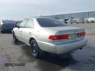 2001 Toyota Camry CE with VIN 4T1BG22KX1U867930, listed as a IAAI auction lot 41764995 with 216,679 mi miles. Bid and sale history available at carsss.com. Image 3.
