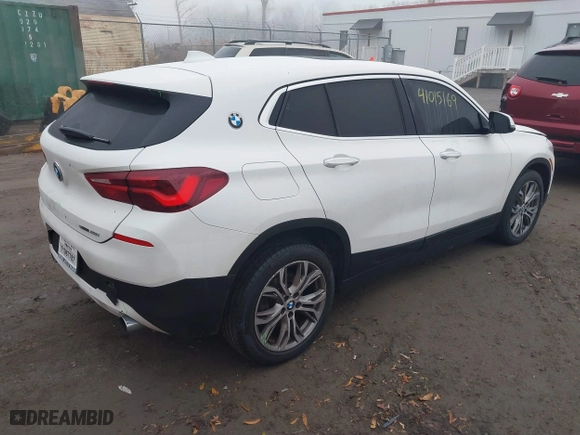 2022 BMW X2 sDrive28i with VIN WBXYH9C04N5U25732, listed as a IAAI auction lot 41015169 with 65,526 mi miles. Bid and sale history available at carsss.com. Image 4.