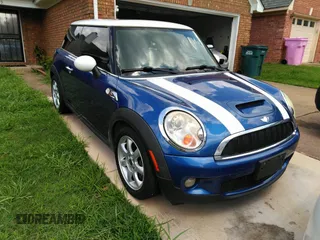 2009 MINI Hardtop S with VIN WMWMF735X9TW80840, listed as a IAAI auction lot 42717130 with 101,073 mi miles and . Bid and sale history available at DreamBid. Image 1.