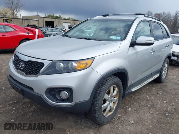2012 Kia Sorento LX with VIN 5XYKTDA69CG280705, listed as a IAAI auction lot 42055542 with 142,770 mi miles. Bid and sale history available at carsss.com. Image 2.