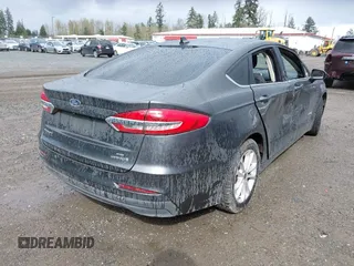 2019 Ford Fusion SE with VIN 3FA6P0LU6KR272193, listed as a IAAI auction lot 41993485 with 132,845 mi miles and . Bid and sale history available at DreamBid. Image 4.
