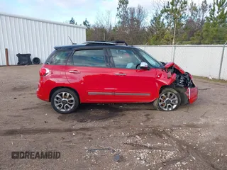 2014 FIAT 500L Lounge with VIN ZFBCFACH7EZ005169, listed as a IAAI auction lot 41250084 with 132,605 mi miles and . Bid and sale history available at DreamBid. Image 13.