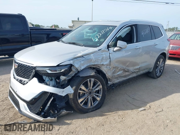 2020 Cadillac XT6 FWD Premium Luxury z VIN 1GYKPCRSXLZ136057, wystawiony jako IAAI lot #42211514 z przebiegiem 32 476 mil mil oraz . Historia ofert i sprzedaży dostępna na DreamBid. Obrazek 17.