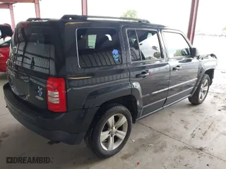 2014 Jeep Patriot Latitude with VIN 1C4NJRFB7ED784130, listed as a IAAI auction lot 41939216 with 141,250 mi miles. Bid and sale history available at carsss.com. Image 4.