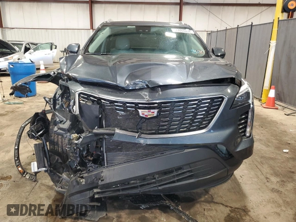 2021 Cadillac XT4 AWD Luxury with VIN 1GYFZBR49MF074936, listed as a Copart auction lot 66884034 with 38,695 mi miles and Salvage Title. Bid and sale history available at carsss.com. Image 5.