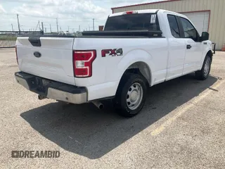 2019 Ford F-150 XL with VIN 1FTFX1E59KKE52570, listed as a IAAI auction lot 42141850 with 143,512 mi miles. Bid and sale history available at carsss.com. Image 1.
