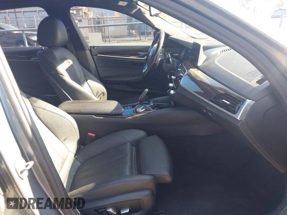2017 BMW 5 Series 530i with VIN WBAJA5C34HG897019, listed as a IAAI auction lot 42393537 with 94,578 mi miles and . Bid and sale history available at DreamBid. Image 5.