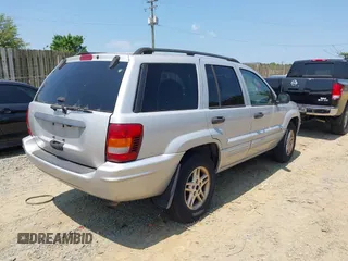 2004 Jeep Grand Cherokee Laredo with VIN 1J4GW48S94C369643, listed as a IAAI auction lot 42693998 with 225,033 mi miles and . Bid and sale history available at DreamBid. Image 4.