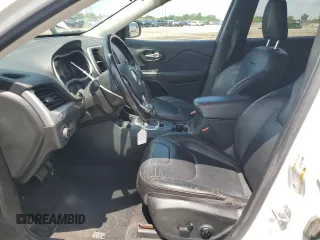 2015 Jeep Cherokee Trailhawk with VIN 1C4PJMBSXFW651000, listed as a Copart auction lot 64110515 with 135,571 mi miles and Clean title. Bid and sale history available at DreamBid. Image 7.