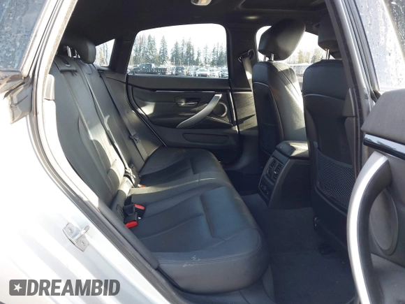 2016 BMW 4 Series 428i xDrive with VIN WBA4C9C5XGG135893, listed as a IAAI auction lot 41976541 with 86,987 mi miles and . Bid and sale history available at carsss.com. Image 8.
