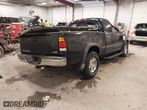 2001 Toyota Tundra SR5 with VIN 5TBRT34131S169696, listed as a IAAI auction lot 41481456 with 215,679 mi miles and . Bid and sale history available at DreamBid. Image 4.