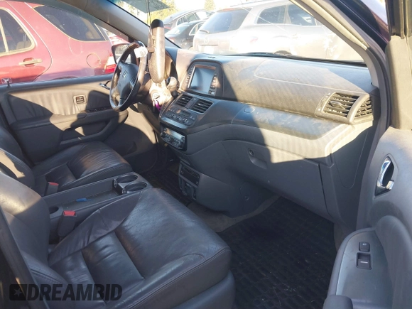 2006 Honda Odyssey TOURING with VIN 5FNRL38866B058344, listed as a IAAI auction lot 41298331 with 156,784 mi miles. Bid and sale history available at carsss.com. Image 5.