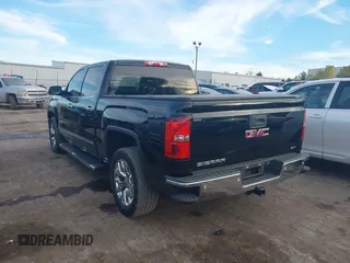 2014 GMC Sierra 1500 SLT with VIN 3GTP1VEC9EG404865, listed as a IAAI auction lot 40850083 with 50,176 mi miles and . Bid and sale history available at DreamBid. Image 3.