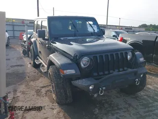 2020 Jeep Wrangler Unlimited Sport S with VIN 1C4HJXDN2LW165046, listed as a IAAI auction lot 42400876 with 92,100 mi miles and . Bid and sale history available at DreamBid. Image 1.
