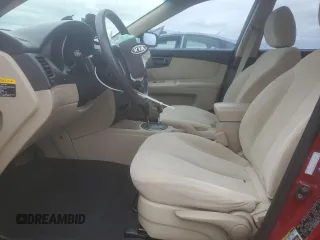 2009 Kia Optima LX z VIN KNAGE228395313765, wystawiony jako Copart lot #59707675 z przebiegiem 170 773 mil mil oraz Szkoda całkowita • Salvage title. Historia ofert i sprzedaży dostępna na DreamBid. Obrazek 7.