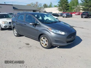 2016 Ford Fiesta SE z VIN 3FADP4BJ3GM113805, wystawiony jako IAAI lot #42280502 z przebiegiem 176 142 mil mil oraz . Historia ofert i sprzedaży dostępna na DreamBid. Obrazek 1.
