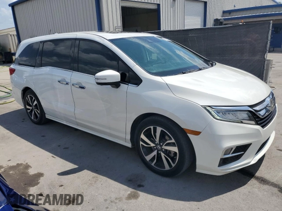 2020 Honda Odyssey Elite with VIN 5FNRL6H99LB063690, listed as a Copart auction lot 51225435 with 70,721 mi miles and Salvage Title. Bid and sale history available at DreamBid. Image 4.