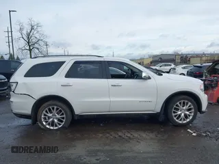 2014 Dodge Durango Citadel with VIN 1C4RDJEG0EC476018, listed as a IAAI auction lot 41212456 with 154,929 mi miles and . Bid and sale history available at DreamBid. Image 13.
