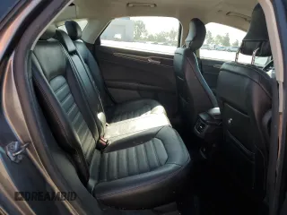 2013 Ford Fusion SE Hybrid z VIN 3FA6P0LU0DR274279, wystawiony jako Copart lot #57462315 z przebiegiem 272 825 mil mil oraz Szkoda całkowita • Salvage title. Historia ofert i sprzedaży dostępna na DreamBid. Obrazek 10.