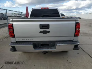 2015 Chevrolet Silverado 1500 LT with VIN 3GCPCREC3FG533011, listed as a Copart auction lot 45026255 with 118,852 mi miles and Salvage Title. Bid and sale history available at DreamBid. Image 6.