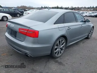 2013 Audi A6 Prestige z VIN WAUHGAFC2DN009441, wystawiony jako IAAI lot #41848400 z przebiegiem 147 198 mil mil oraz . Historia ofert i sprzedaży dostępna na DreamBid. Obrazek 4.