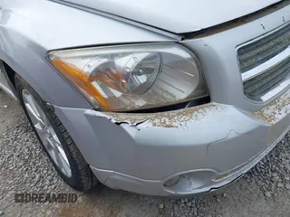 2011 Dodge Caliber Heat with VIN 1B3CB5HA0BD237473, listed as a IAAI auction lot 41690622 with 205,961 mi miles and . Bid and sale history available at DreamBid. Image 12.