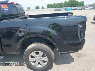2019 Ford Ranger XL z VIN 1FTER1EHXKLA36781, wystawiony jako IAAI lot #42349085 z przebiegiem 39 311 mil mil oraz . Historia ofert i sprzedaży dostępna na DreamBid. Obrazek 21.