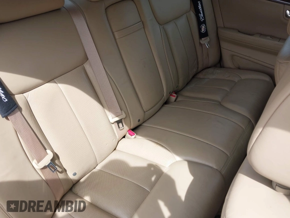 2006 Cadillac DTS w/1SE with VIN 1G6KD57996U113240, listed as a IAAI auction lot 42120004 with 120,806 mi miles. Bid and sale history available at carsss.com. Image 8.