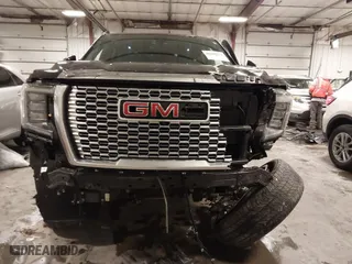 2021 GMC Yukon XL Denali with VIN 1GKS2JKL3MR149850, listed as a IAAI auction lot 41588274 with 77,181 mi miles. Bid and sale history available at carsss.com. Image 13.