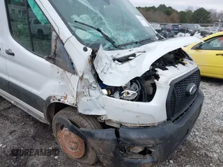 2021 Ford Transit Cargo with VIN 1FTBR1C87MKA12520, listed as a IAAI auction lot 41143999 with 88,943 mi miles and . Bid and sale history available at DreamBid. Image 6.