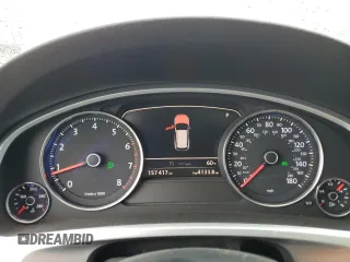 2014 Volkswagen Touareg Sport с VIN WVGEF9BP0ED014429, выставлен на аукционе Copart как лот 58692875 с пробегом 157 417 миль миль и Списание • Salvage title. История ставок и продаж доступна на DreamBid. Изображение 9.