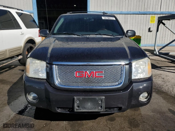 2006 GMC Envoy Denali with VIN 1GKES63M562342854, listed as a Copart auction lot 47077205 with 194,704 mi miles and Clean Title. Bid and sale history available at carsss.com. Image 5.