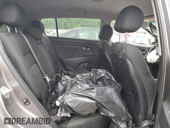2012 Kia Sportage LX z VIN KNDPB3A20C7217165, wystawiony jako Copart lot #60999525 z przebiegiem 128 231 mil mil oraz Szkoda całkowita • Salvage title. Historia ofert i sprzedaży dostępna na DreamBid. Obrazek 11.