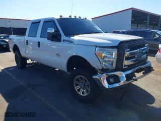 2015 Ford Super Duty F-250 SRW Lariat with VIN 1FT7W2BT9FEA55736, listed as a IAAI auction lot 41339175 with 355,582 mi miles. Bid and sale history available at carsss.com. Image 1.