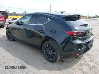 2021 Mazda 3 Premium Plus z VIN JM1BPBNY2M1403797, wystawiony jako IAAI lot #42031637 z przebiegiem Nie podano mil oraz . Historia ofert i sprzedaży dostępna na DreamBid. Obrazek 3.
