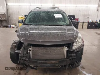 2015 Chevrolet Traverse LT with VIN 1GNKVHKD5FJ192552, listed as a IAAI auction lot 41708239 with 185,664 mi miles and . Bid and sale history available at DreamBid. Image 13.