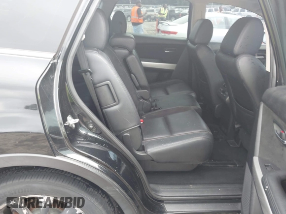 2015 Mazda CX-9 Grand Touring with VIN JM3TB2DA1F0464517, listed as a IAAI auction lot 42484985 with 104,932 mi miles and . Bid and sale history available at DreamBid. Image 8.