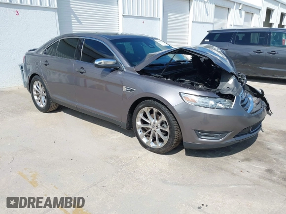 2014 Ford Taurus Limited with VIN 1FAHP2F89EG102814, listed as a IAAI auction lot 41999304 with 254,644 mi miles. Bid and sale history available at carsss.com. Image 1.