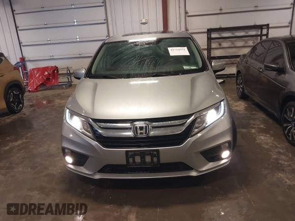 2018 Honda Odyssey EX-L with VIN 5FNRL6H74JB102004, listed as a IAAI auction lot 41724551 with 85,083 mi miles and . Bid and sale history available at DreamBid. Image 13.