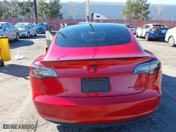 2021 Tesla Model 3 Performance with VIN 5YJ3E1EC7MF997237, listed as a IAAI auction lot 41387544 with 64,450 mi miles. Bid and sale history available at carsss.com. Image 16.