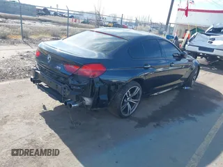 2017 BMW M6 z VIN WBS6E9C58HG437411, wystawiony jako IAAI lot #41636164 z przebiegiem 52 724 mil mil oraz . Historia ofert i sprzedaży dostępna na DreamBid. Obrazek 4.