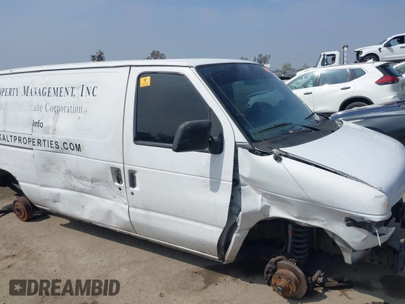 1999 Ford Econoline Cargo with VIN 1FTRE1421XHA35992, listed as a IAAI auction lot 42008448 with 293,689 mi miles and . Bid and sale history available at carsss.com. Image 6.