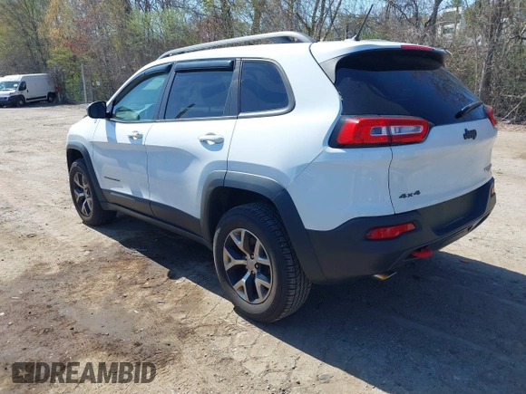 2014 Jeep Cherokee Trailhawk with VIN 1C4PJMBS8EW163212, listed as a IAAI auction lot 42124107 with 114,999 mi miles. Bid and sale history available at carsss.com. Image 3.