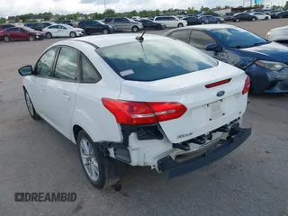 2017 Ford Focus SE with VIN 1FADP3F28HL285649, listed as a IAAI auction lot 39718289 with 118,366 mi miles and . Bid and sale history available at DreamBid. Image 3.