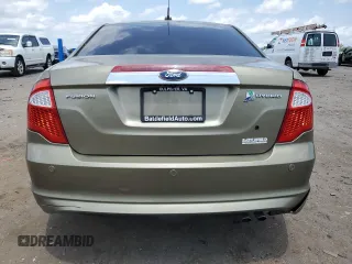 2012 Ford Fusion Hybrid z VIN 3FADP0L33CR210203, wystawiony jako Copart lot #59774345 z przebiegiem 132 152 mil mil oraz Szkoda całkowita • Salvage title. Historia ofert i sprzedaży dostępna na DreamBid. Obrazek 6.